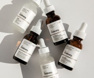 Hybrid skincare products combining makeup and skincare benefits, featuring a serum foundation and SPF-infused moisturizer for a natural, glowing look.